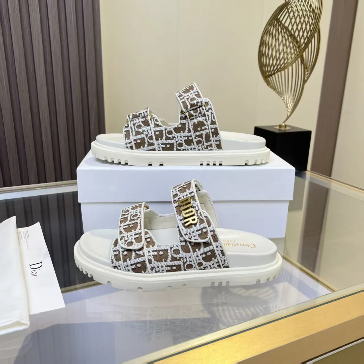 👟👟Ex-factory price 480👟👟 Dior classic popular sandals Step into the fashion territory of Dior slippers and encounter the ultimate fusion of elegance and comfort. The upper is engraved with the Christian Dior Paris logo using exquisite embroidery technology. The delicate stitching tells the brand's profound heritage and is fully recognizable.   Made of high-quality materials, it feels soft and fits your feet, as if it is a gentle care tailor-made for your feet. The sole is carefully designed and engraved with Christian Dior's lucky star symbol. It is not only a beautiful embellishment, but also provides reliable grip, making every step steady and secure.   It has a simple design and is easy to put on and take off. Whether it is a lazy weekend or a pleasant vacation, it can be easily adapted. Whether paired with casual shorts, casual jeans, or an elegant dress, Dior slippers can instantly enhance the overall style and show a casual fashion attitude.   Dior slippers, in the name of fashion, inject luxurious charm into your life and accompany you with every step you take with confidence and elegance. Material: Fine genuine cowhide upper, outsole, TPR, non-slip and wear-resistant, code number: 35-41 (42 customized)